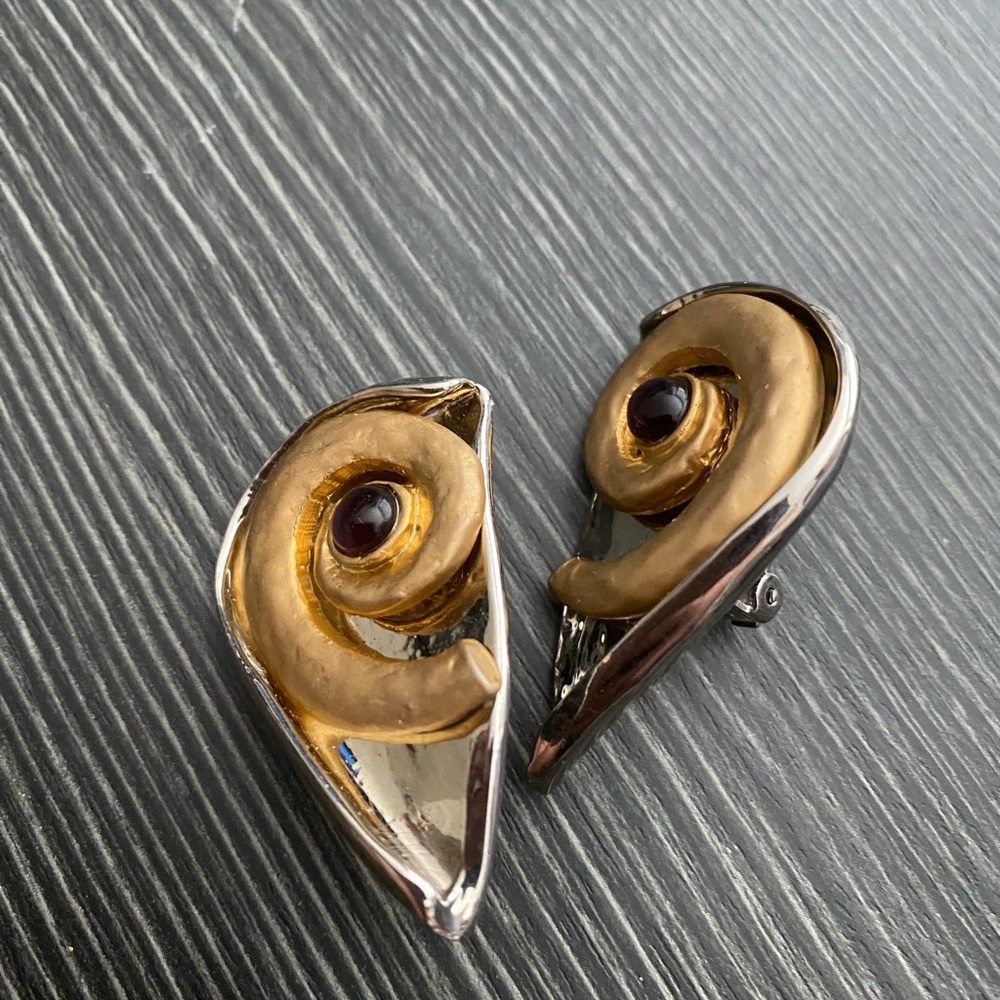 Elegant Gold and Silver Swirl Earrings with purple Detail